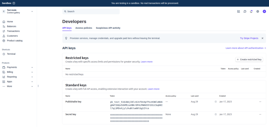 Stripe Dashboard in Sandbox mode showing the API keys page with a publishable test key and a completely masked secret key